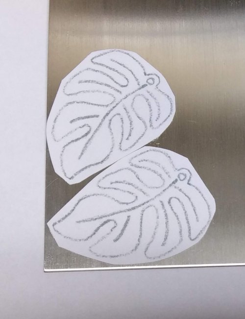 Judy Larson's Tropical Leaf Earrings - , Contemporary Wire Jewelry, Sawing, Saw, Wire Saw, Texturing, Cut the designs out with a saw.